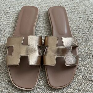 Hermes Metallic Gold Slide Sandals